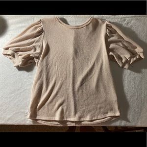 Soft tan shirt with short, bell style sleeves